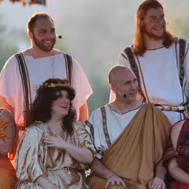 The nobility sit greatly amused by the ineptitude of the play staged by the Mechanicals in A Midsummer Night's Dream.