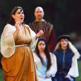 The goddess Juno sings a marriage blessing to Miranda and Prince Ferdinand as Prospero oversees the festivity in the play The Tempest.
